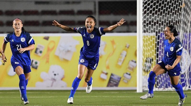 Philippine players celebrate a goal against Vietnam during the Women