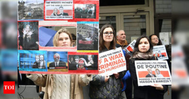 Protesters in Paris rally against 'blood money' of Russian deputy defence minister - Times of India