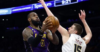 LeBron James #6 of the Los Angeles Lakers takes a shot against Nikola Jokic #15 of the Denver Nuggets in the second half at Crypto.com Arena on December 16, 2022 in Los Angeles, California