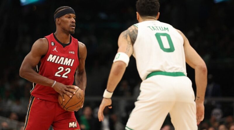 Jimmy Butler #22 of the Miami Heat is defended by Jayson Tatum #0 of the Boston Celtics during the third quarter of game one of the Eastern Conference Finals at TD Garden on May 17, 2023 in Boston, Massachusetts.