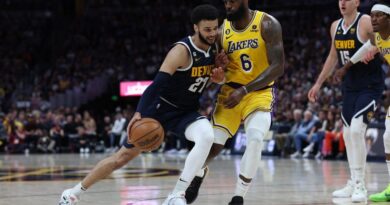 Jamal Murray #27 of the Denver Nuggets drives against LeBron James #6 of the Los Angeles Lakers during the third quarter in game two of the Western Conference Finals at Ball Arena on May 18, 2023 in Denver, Colorado.