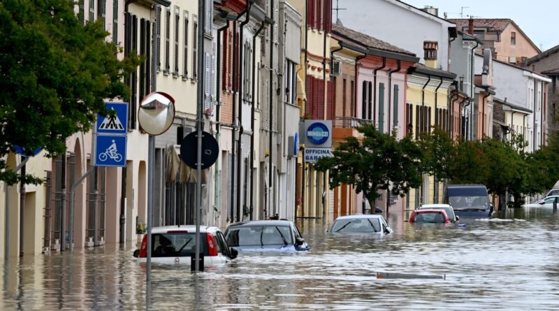 Italy floods trigger blame game