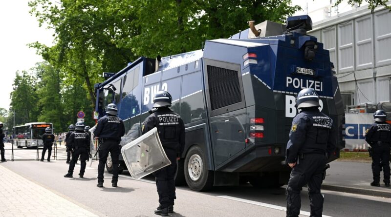 German police raid climate activists’ homes