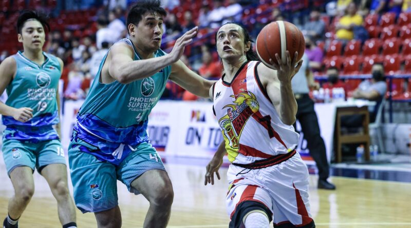 Terrence Romeo (with ball) goes for two of his 27 points against Phoenix center Raul Soyud.