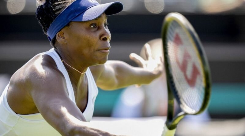 US Venus Williams attempts to return the ball to Switzerland