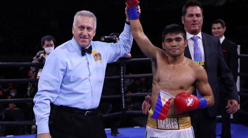 Marlon Tapales has his hand lifted by referee Jack Reiss after defeating Hiroaki Teshigawara by way of knockout at Dignity Health Sports Park on December 11, 2021 in Carson, California.