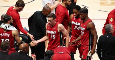 Miami Heat players react during a timeout during the second quarter against the Denver Nuggets in Game One of the 2023 NBA Finals at Ball Arena on June 01, 2023 in Denver, Colorado.