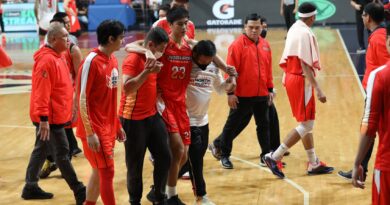 NorthPort rookie William Navarro hobbles to the bench. –PBA IMAGES