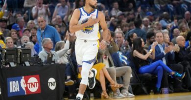 Golden State Warriors guard Stephen Curry gestures after making a 3-point basket against the Phoenix Suns during the first half of an NBA basketball game in San Francisco, Tuesday, Oct. 24, 2023.