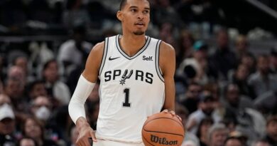 San Antonio Spurs center Victor Wembanyama brings the ball up against the Dallas Mavericks during the second half of an NBA basketball game in San Antonio, Wednesday, Oct. 25, 2023.