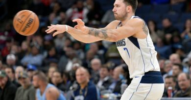 Dallas Mavericks guard Luka Doncic (77) passes the ball in the first half of an NBA basketball game against the Memphis Grizzlies, Monday, Oct. 30, 2023, in Memphis,