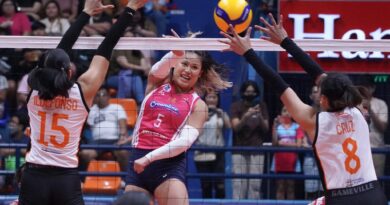 Creamline’s Risa Sato (center) fires a kill against the Farm Fresh wall. —AUGUST DELA CRUZ