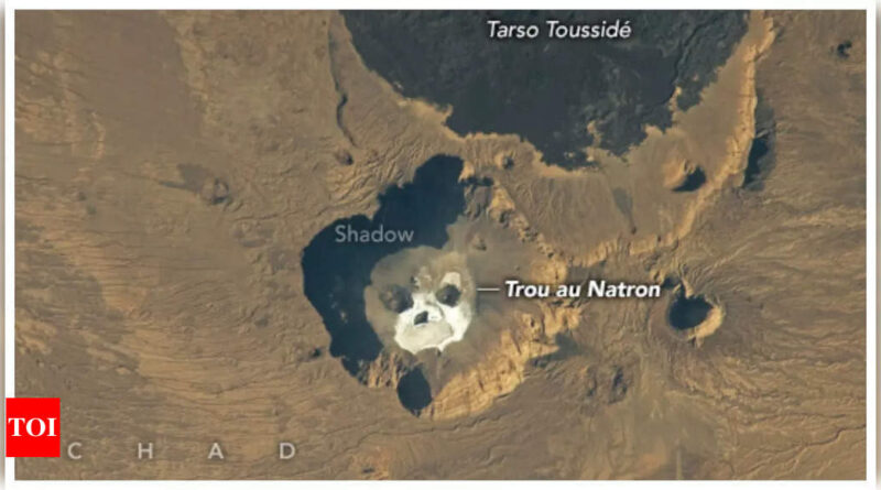 A ghostly face in the rock: Nasa releases eerie image of 'skull' in a volcanic pit in Sahara - Times of India