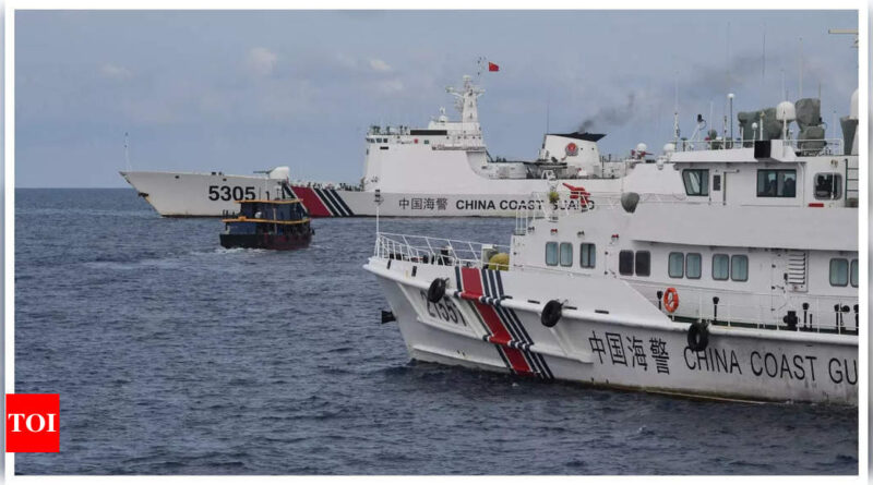 China says took 'control measures' against Philippine ships in its waters - Times of India