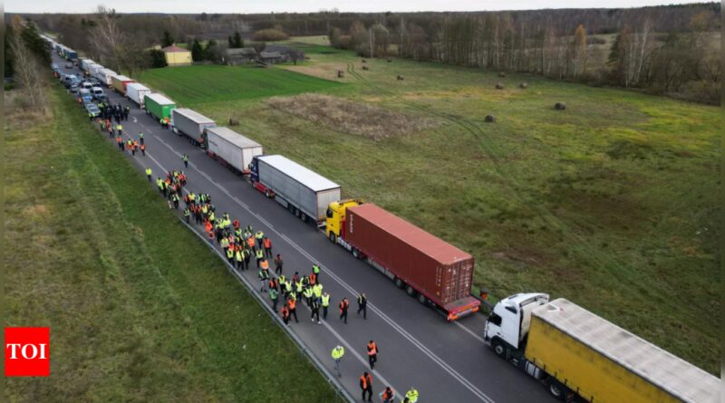 Around 3,000 trucks stuck at Ukrainian border due to Polish drivers' blockade - Times of India